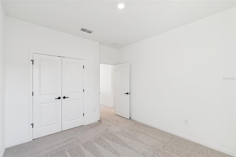 Spacious, unfurnished interior of a new home in Weslyn Park in Sunbridge 34', St. Cloud (Image 41).