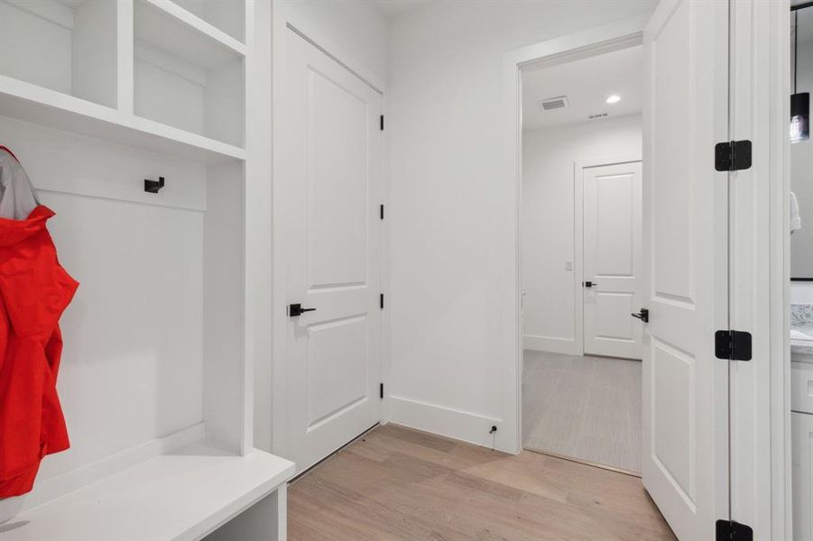 Mudroom featuring light hardwood / wood-style flooring