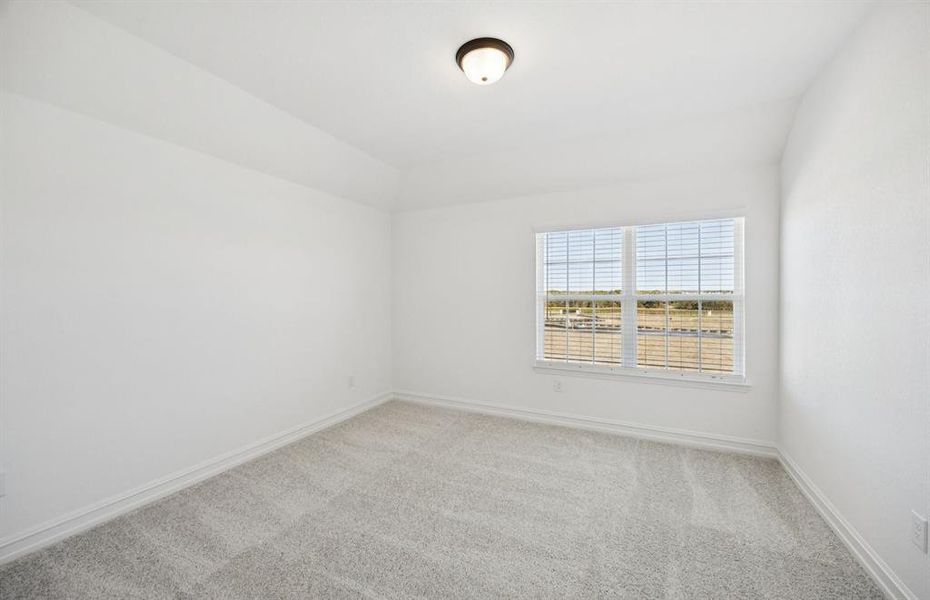 Comfortable bedroom with a bright window view