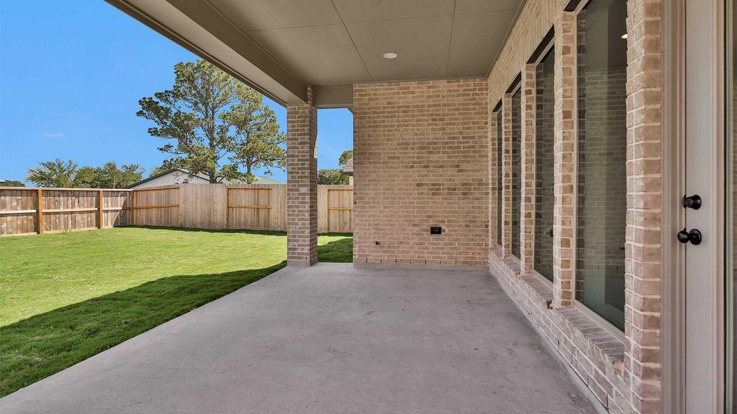 Exterior details and patio area of a home in Candela South 50', Richmond (Image 2).