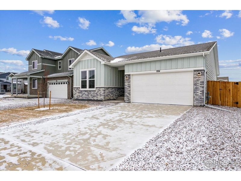 Front exterior of a new home in The Overlook at Johnstown Farms, Johnstown, CO, highlighting curb appeal (Image 20).