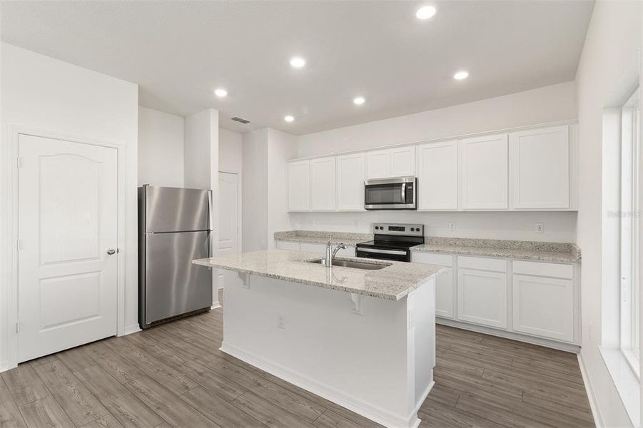 Furnished interior view inside a new home in Peach Crossings, Winter Haven (Image 10).