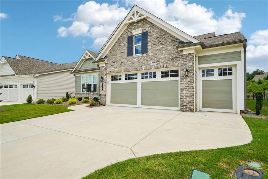 Front exterior of a new home in , Hoschton, GA, highlighting curb appeal (Image 28). Front exterior of a new home in , Hoschton, GA, highlighting curb appeal (Image 28).