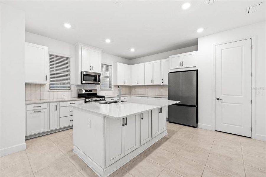 Furnished interior view inside a new home in Harvest At Ovation 50s, Winter Garden (Image 6).