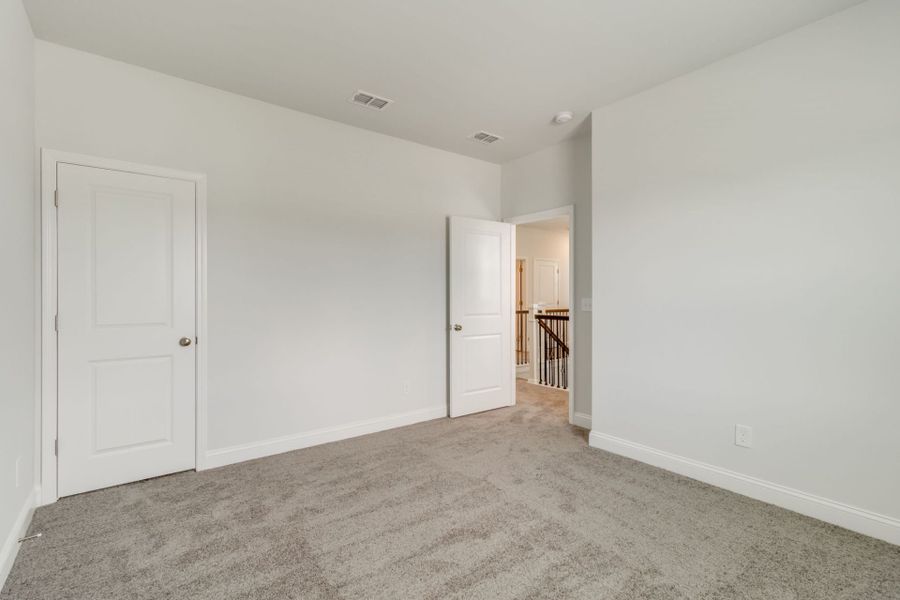 Spacious, unfurnished interior of a new home in Pecan Orchard, Elgin (Image 32).