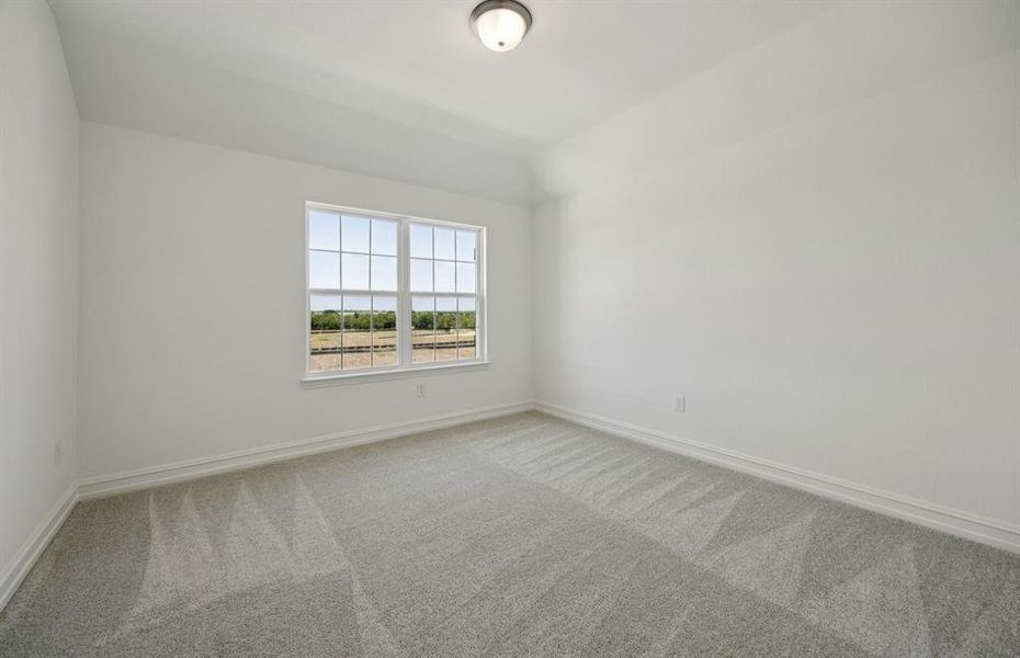 Roomy secondary bedroom with extensive closet storage *Real home pictured Roomy secondary bedroom with extensive closet storage *Real home pictured