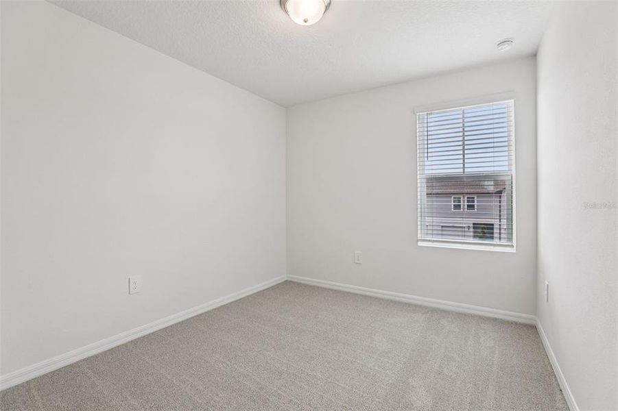 Spacious, unfurnished interior of a new home in Cagan Crossings West, Clermont (Image 29).