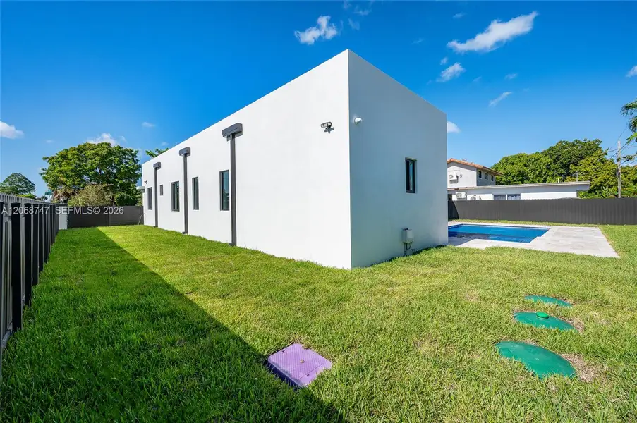 Exterior details and patio area of a home in , Miami (Image 17). Exterior details and patio area of a home in , Miami (Image 17).