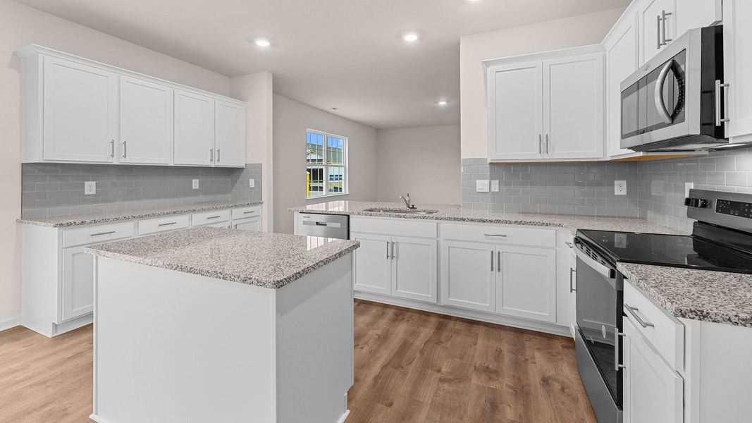 Furnished interior view inside a new home in East Ridge, Ayden (Image 5).