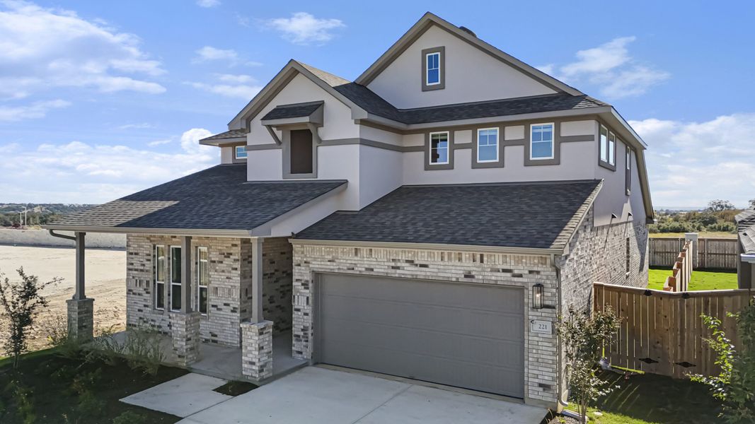 Front exterior of a new home in Highland Village, Georgetown, TX, highlighting curb appeal (Image 26).