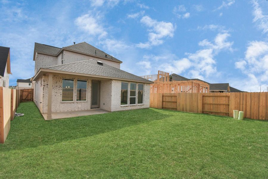 Exterior details and patio area of a home in Elyson, Katy (Image 3).