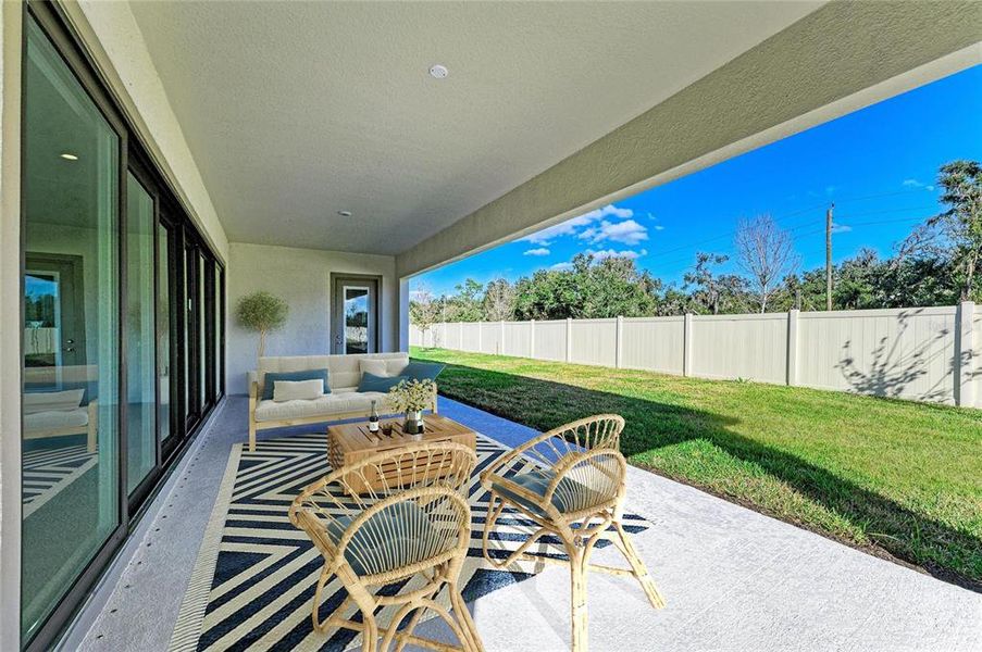 Exterior details and patio area of a home in Crosswind Point, Parrish (Image 3). Exterior details and patio area of a home in Crosswind Point, Parrish (Image 3).