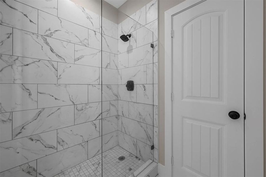 Bathroom featuring walk in shower