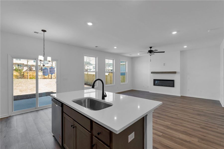 This inviting space combines a functional kitchen