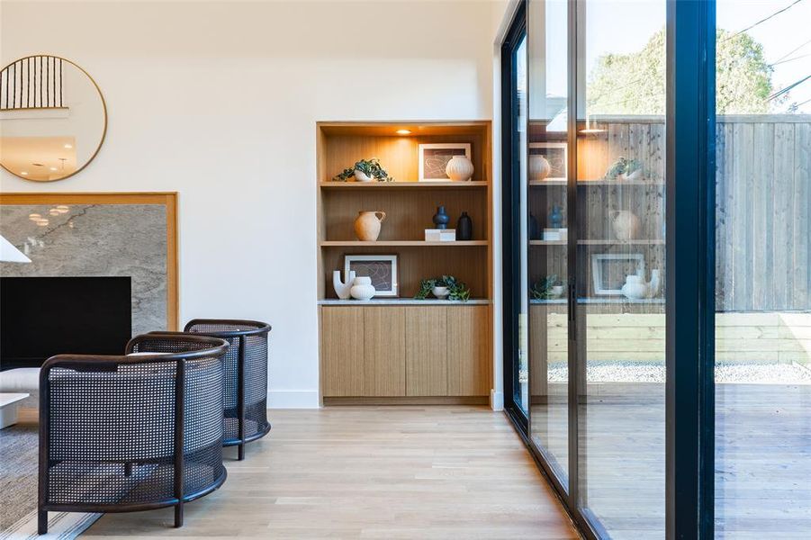 Home office with light wood-type flooring