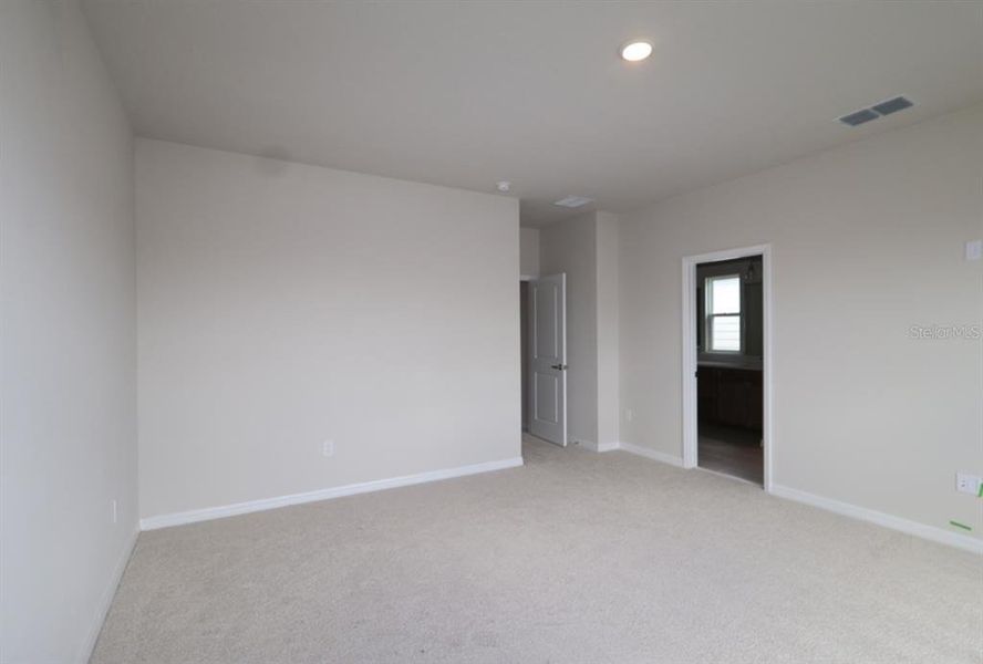 Spacious, unfurnished interior of a new home in Laureate Park at Lake Nona - Garden Series, Orlando (Image 16).