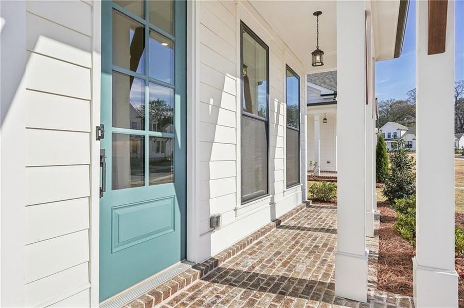 Exterior details and patio area of a home in Promenade at Sawnee Village, Cumming (Image 4).