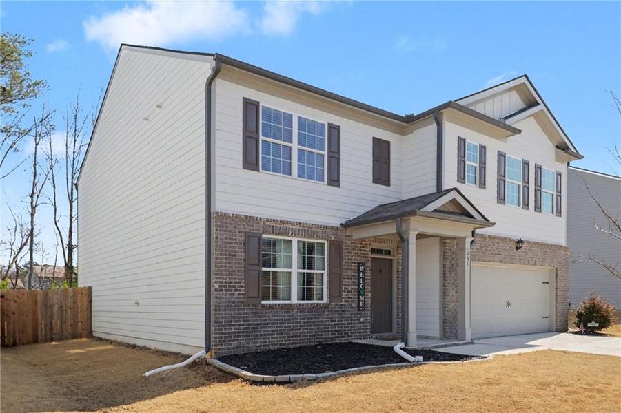 Front exterior of a new home in , Dallas, GA, highlighting curb appeal (Image 28). Front exterior of a new home in , Dallas, GA, highlighting curb appeal (Image 28).