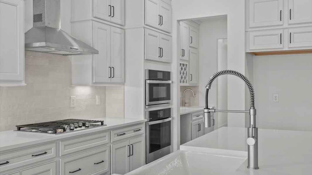 First-class kitchen with a spacious 9-foot island perfect for entertaining