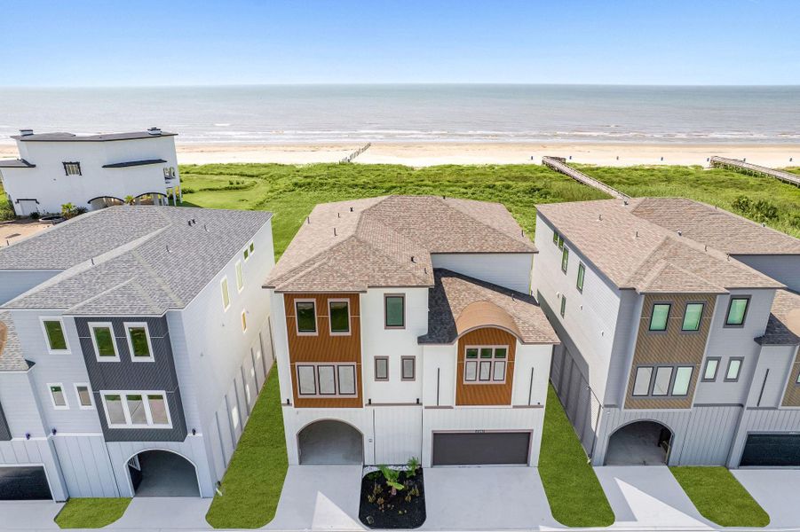 True beachfront home along Galveston's west end beach - Grass was virtually added.