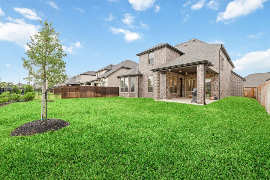 Exterior details and patio area of a home in Elyson, Katy (Image 27).