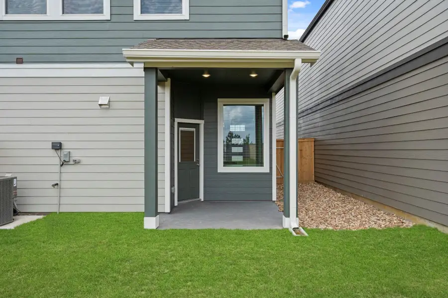 Exterior details and patio area of a home in Bridgeland, Cypress (Image 3). Exterior details and patio area of a home in Bridgeland, Cypress (Image 3).