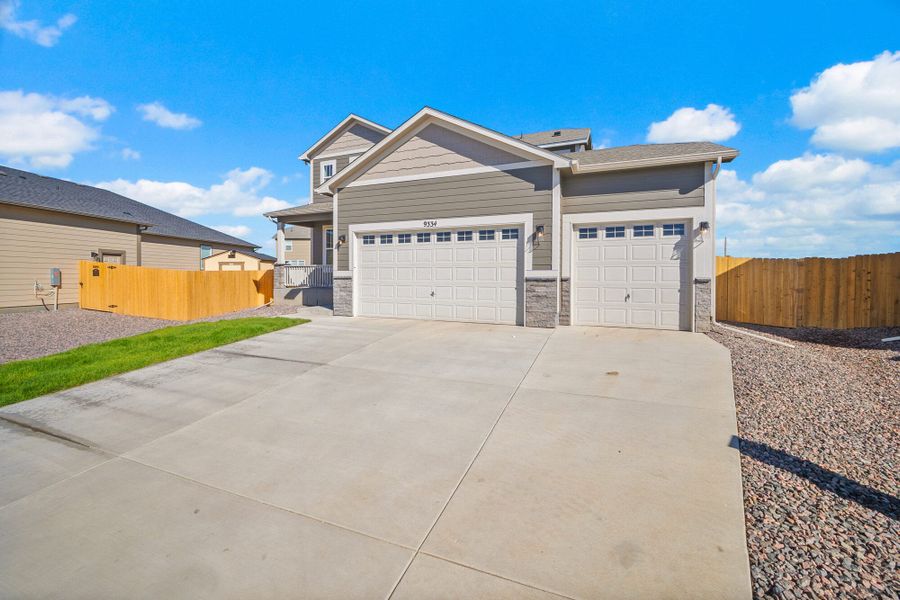 Exterior details and patio area of a home in The Glen-12, Colorado Springs (Image 3).