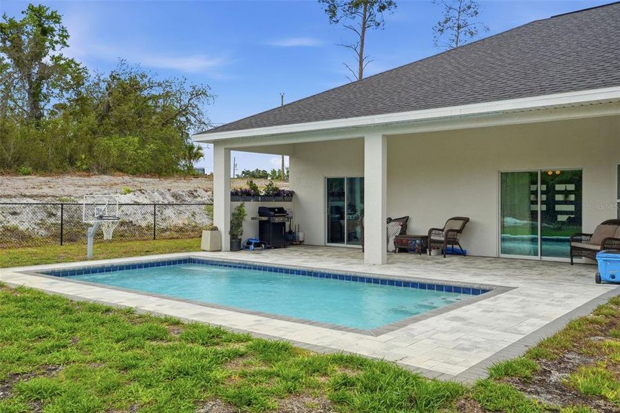 Exterior details and patio area of a home in , Weeki Wachee (Image 24).