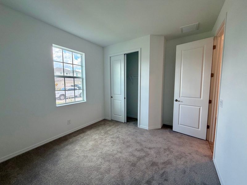 Representative unfurnished interior of a home built from the Juno by William Ryan Homes in The Sanctuary – Resort Collection, Punta Gorda (Image 30).