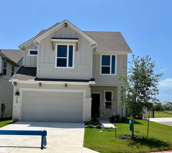 Front exterior of a new home in , Dripping Springs, TX, highlighting curb appeal (Image 1). Front exterior of a new home in , Dripping Springs, TX, highlighting curb appeal (Image 1).