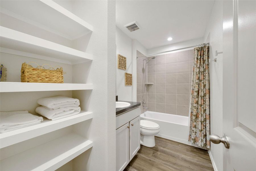 Furnished interior view inside a new home in The Canopies, Splendora (Image 17).