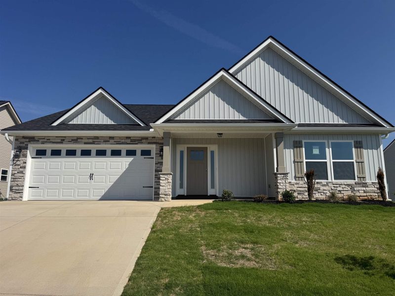 Front exterior of a new home in Davis Heights, Inman, SC, highlighting curb appeal (Image 1). Front exterior of a new home in Davis Heights, Inman, SC, highlighting curb appeal (Image 1).
