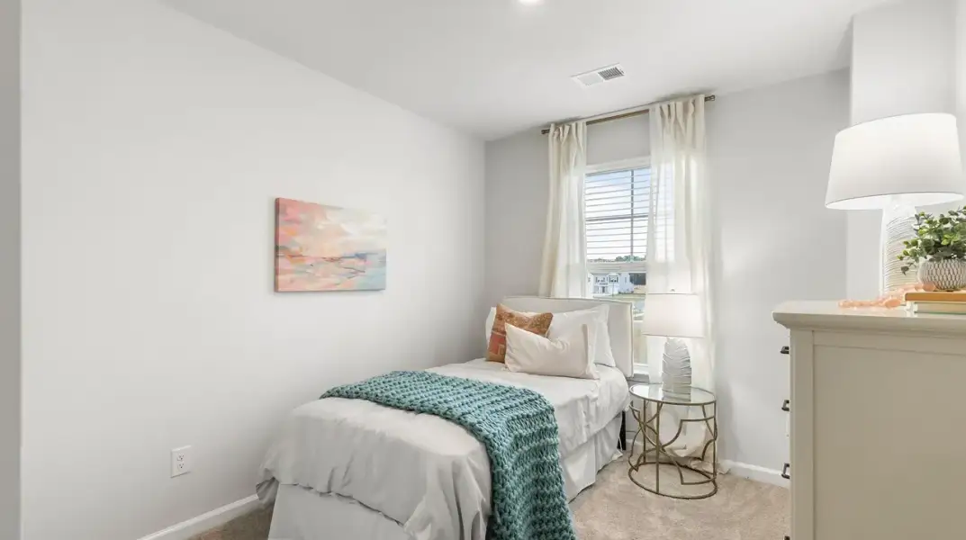 Furnished interior view inside a new home in Pine Hills Townhomes at Cane Bay, Summerville (Image 17).