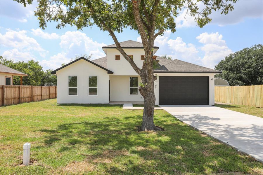Front exterior of a new home in , Bastrop, TX, highlighting curb appeal (Image 22). Front exterior of a new home in , Bastrop, TX, highlighting curb appeal (Image 22).