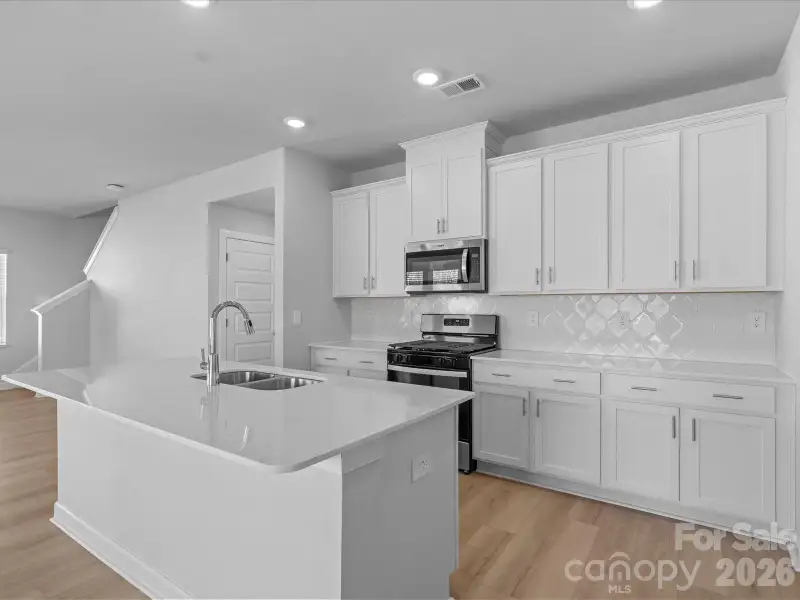 Photo is not of the actual home, but is an inspirational photo of builder’s model home and may depict options, furnishings, and/or decorator features that are not included