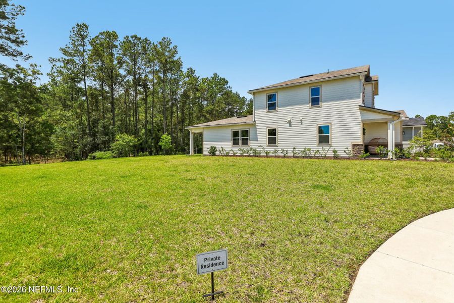 Exterior details and patio area of a home in Seasons at Morada, St. Augustine (Image 24).