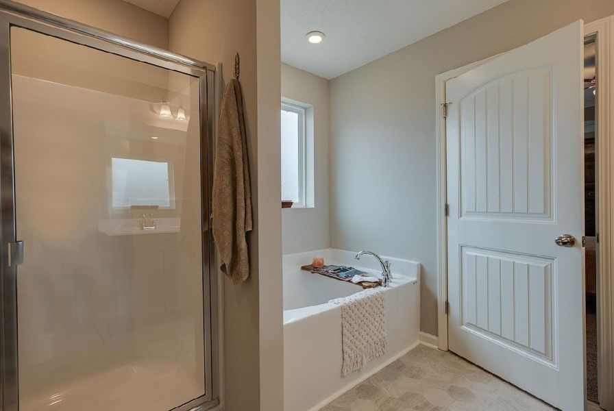 Primary Bathroom.

*Photos are from a staged model home of floor plan. Options and Selections may vary in actual home.