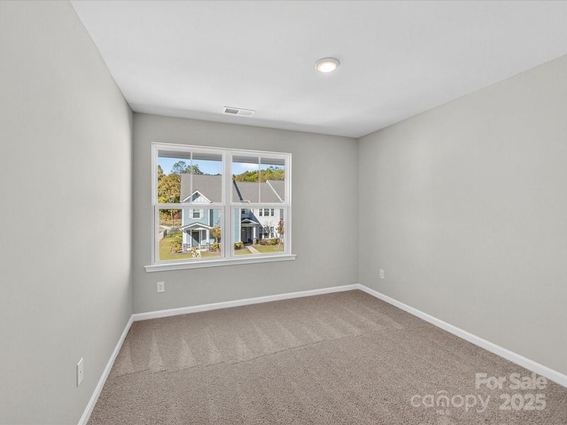 Spacious, unfurnished interior of a new home in North Creek Village - Townhomes, Huntersville (Image 15).