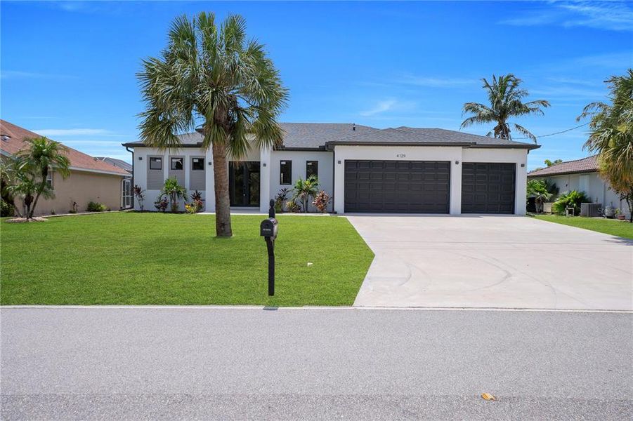 Front exterior of a new home in , Port Charlotte, FL, highlighting curb appeal (Image 26). Front exterior of a new home in , Port Charlotte, FL, highlighting curb appeal (Image 26).