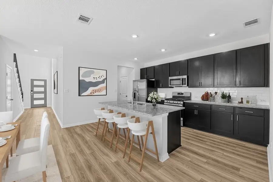 Furnished interior view inside a new home in Sunfield, Buda (Image 5).