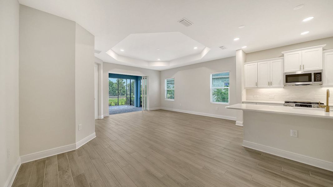 Spacious, unfurnished interior of a new home in Palm Grove Real Estate and Homes for Sale in Lakewood Ranch, FL - Neal Communities, Lakewood Ranch (Image 25). Spacious, unfurnished interior of a new home in Palm Grove Real Estate and Homes for Sale in Lakewood Ranch, FL - Neal Communities, Lakewood Ranch (Image 25).
