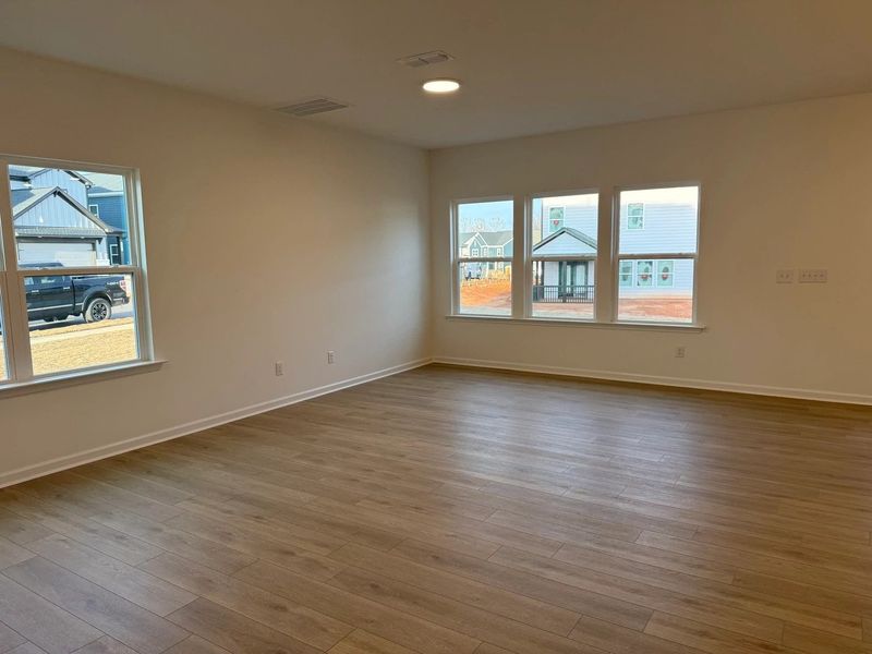 Family Room featuring the AW Collection® Serene - Open space with natural finishes and light.