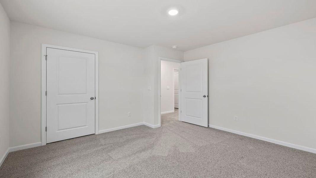 Spacious, unfurnished interior of a new home in Lakestone, Woodruff (Image 33).