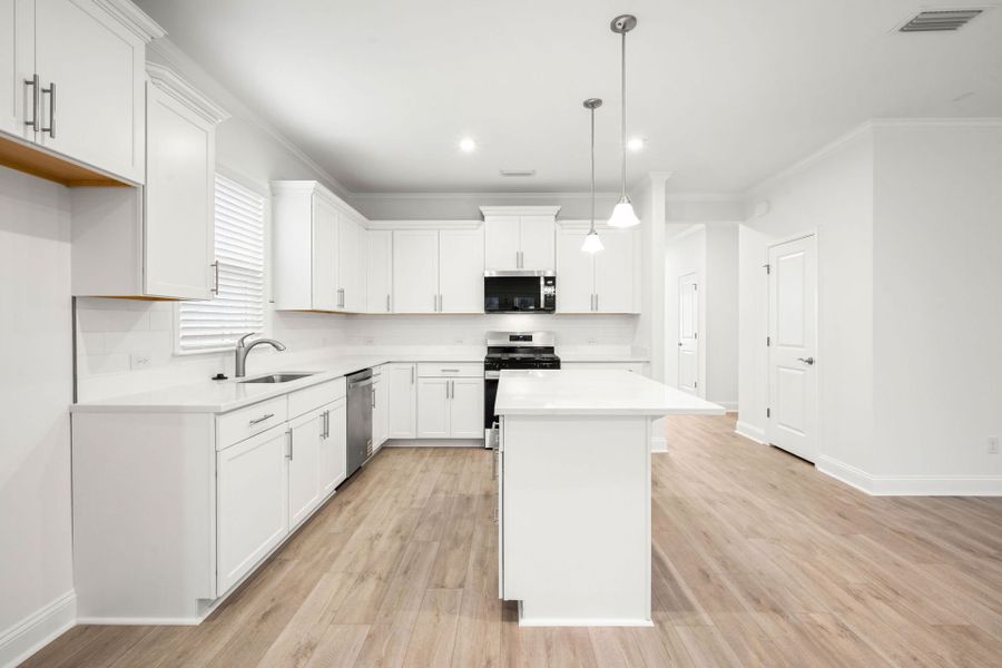 Furnished interior view inside a new home in Salem Bay, Beaufort (Image 9).