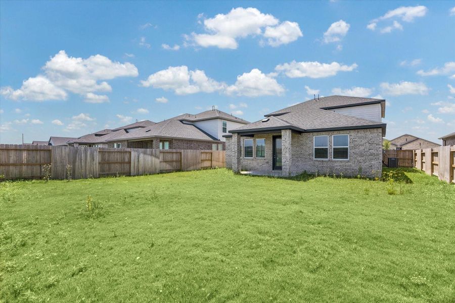 Exterior details and patio area of a home in Bridge Creek 45s and 50s, Cypress (Image 3).