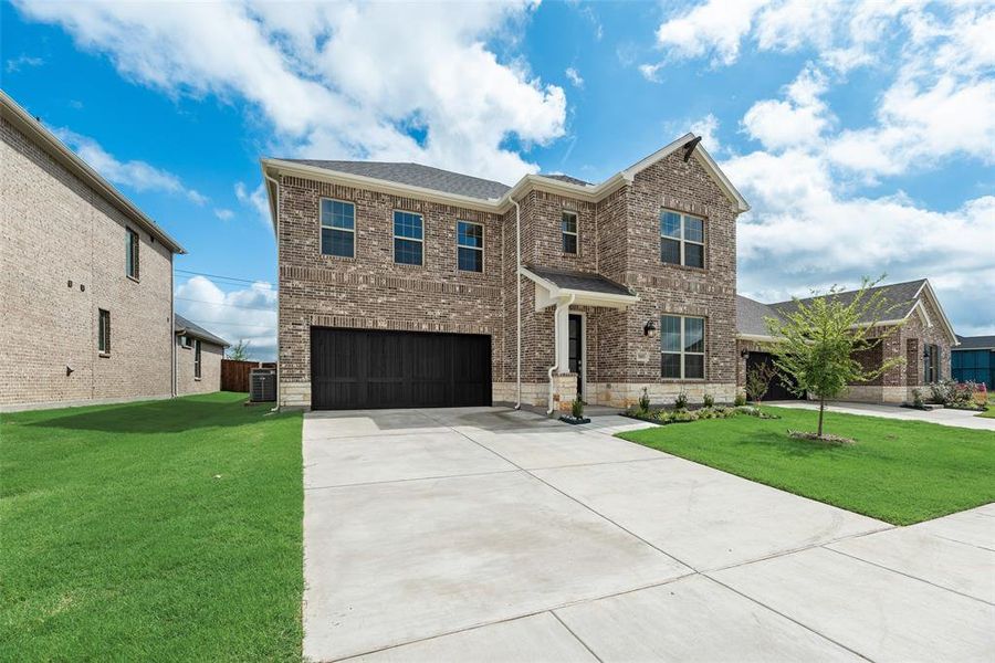 Front exterior of a new home in Sutton Fields, Celina, TX, highlighting curb appeal (Image 2).