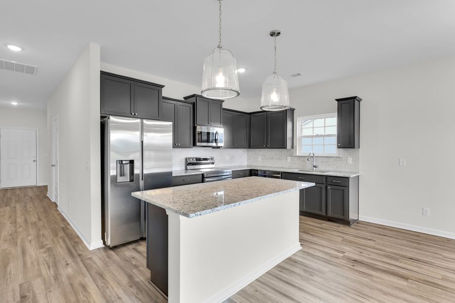 Representative furnished interior of a home built from the The Trask by RTS Homes in Tibet Road at Sassafras, Allenhurst (Image 5).