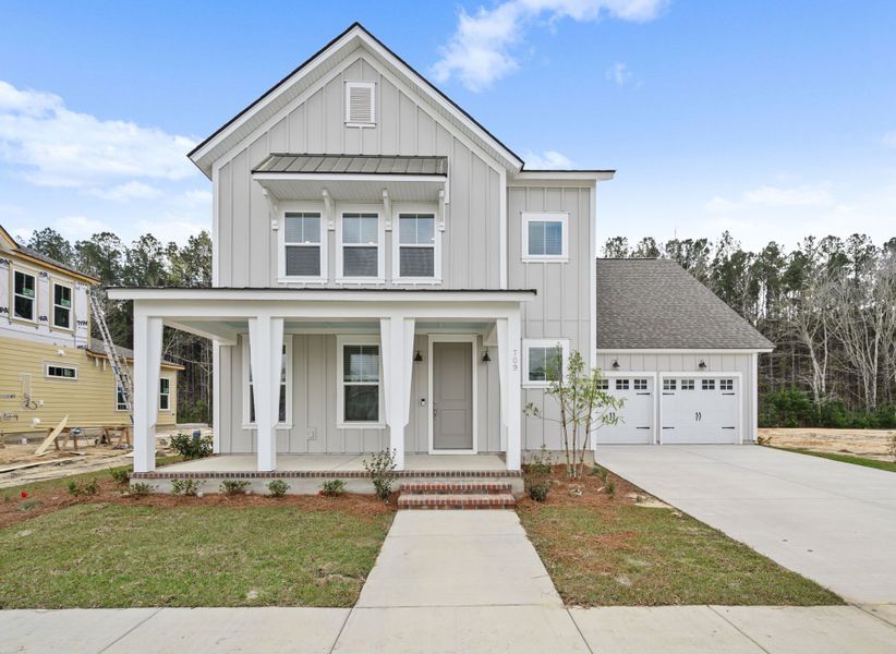 Front exterior of a new home in Nexton, Summerville, SC, highlighting curb appeal (Image 26).