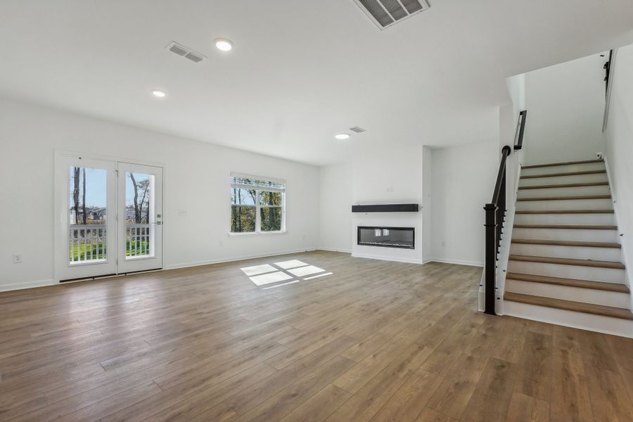 Representative unfurnished interior of a home built from the Macon by Ashton Woods in Rowland's Grant, Fuquay Varina (Image 18).