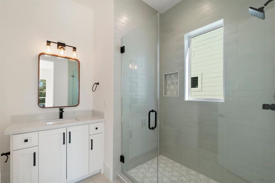 Guest Suite bathroom with Shower and a walk-in closet.